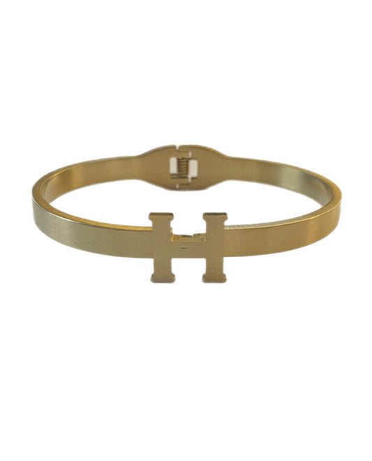 Gold H bracelet